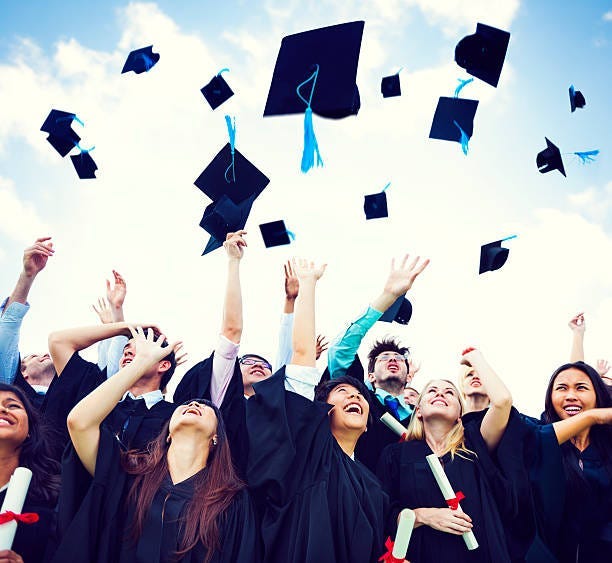 Students celebrating their university achievements