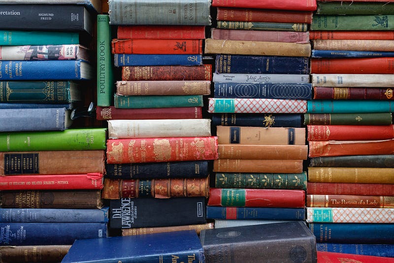 Image of a stack of addiction recovery books