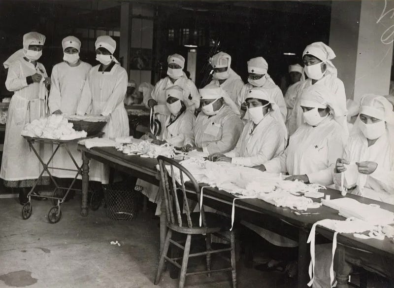 Red Cross workers preparing masks during the pandemic.